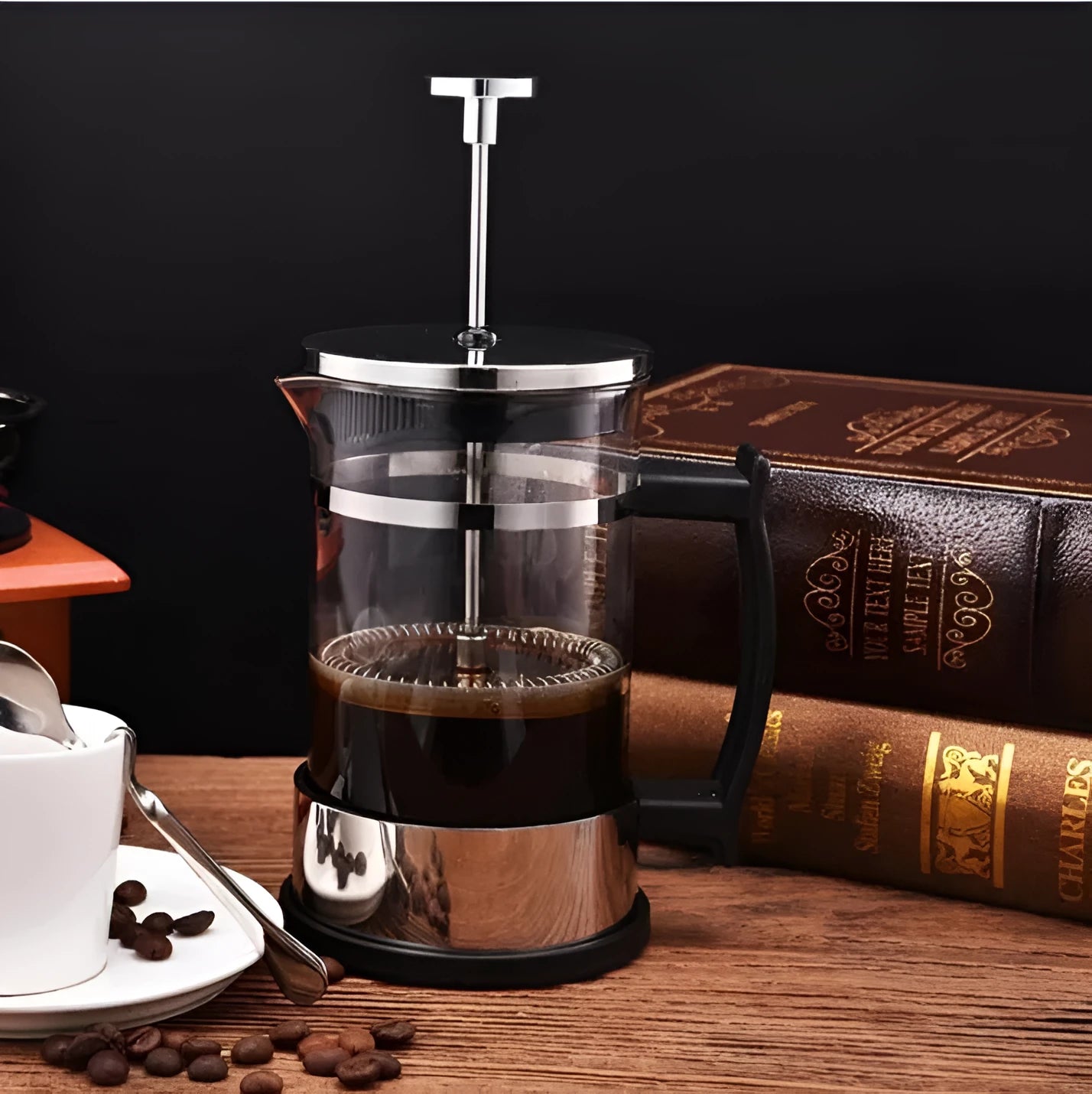Compact glass pour-over coffee maker with stainless steel filter, 350ml capacity, 10cm wide.