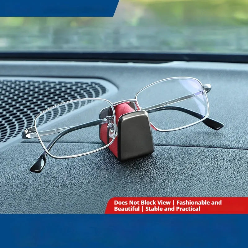 Zinc alloy and leather glasses clip for car dashboard in choice of colours.
