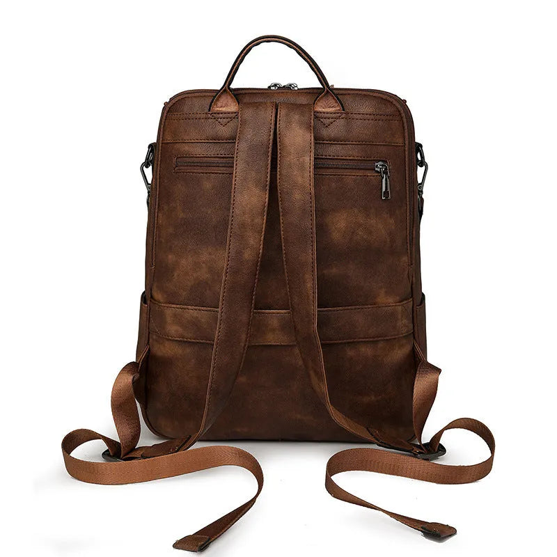 PU leather retro backpack with curved shoulder strap in various colour options