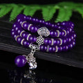 Purple ethnic-style women's bracelet with three circles of polished chalcedony beads on an adjustable band.
