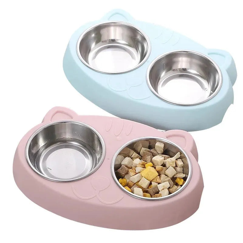 Blue macaron-shaped plastic pet feeder with two bowls for food and water