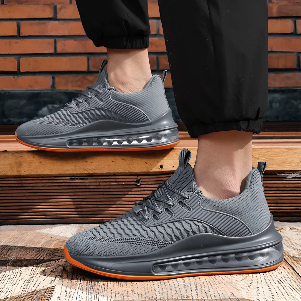 Men's black mesh running shoes with rubber sole and low-top design for sports activities