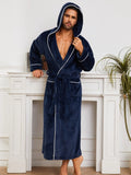Man in a grey flannel bathrobe, European style, for winter home wear.
