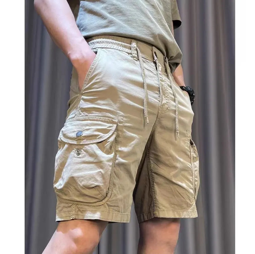 Loose straight-leg casual overalls in khaki with multiple pockets and a Korean-style fit.