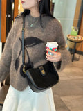 Women's genuine leather crossbody bag in black with sandwich pocket design