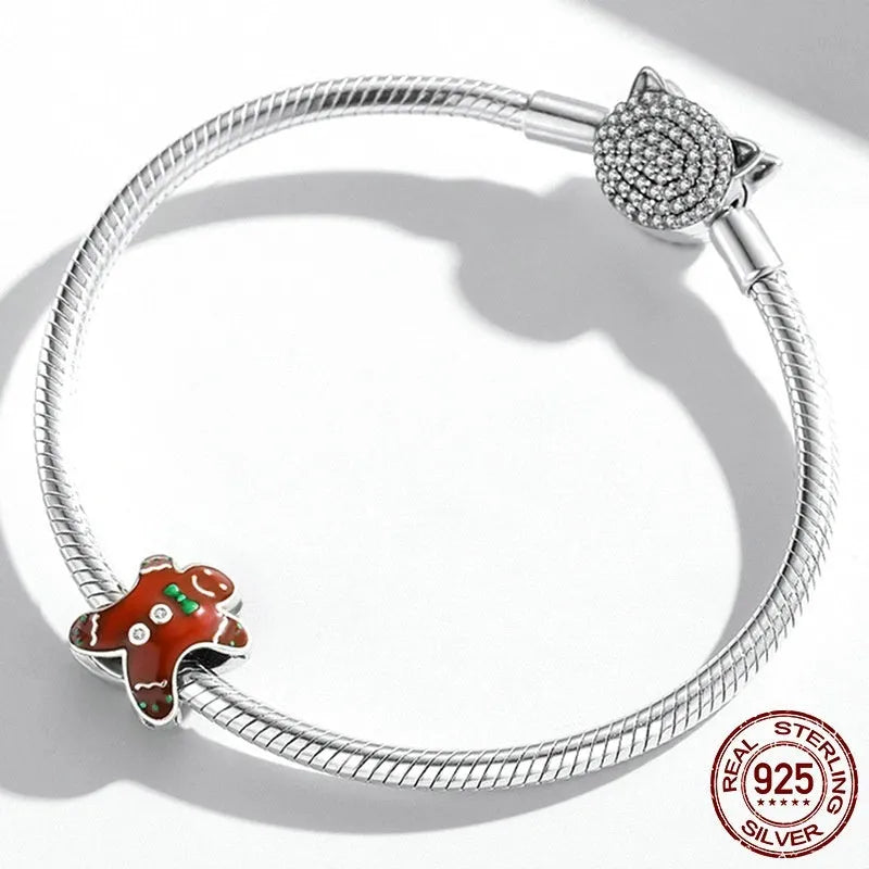Christmas gingerbread man 925 sterling silver bead with dripping oil finish, 1.2cm height, 0.5cm aperture, on white background