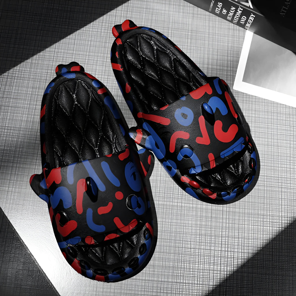 Casual open-toe EVA home slippers with a cute shark design on the upper.