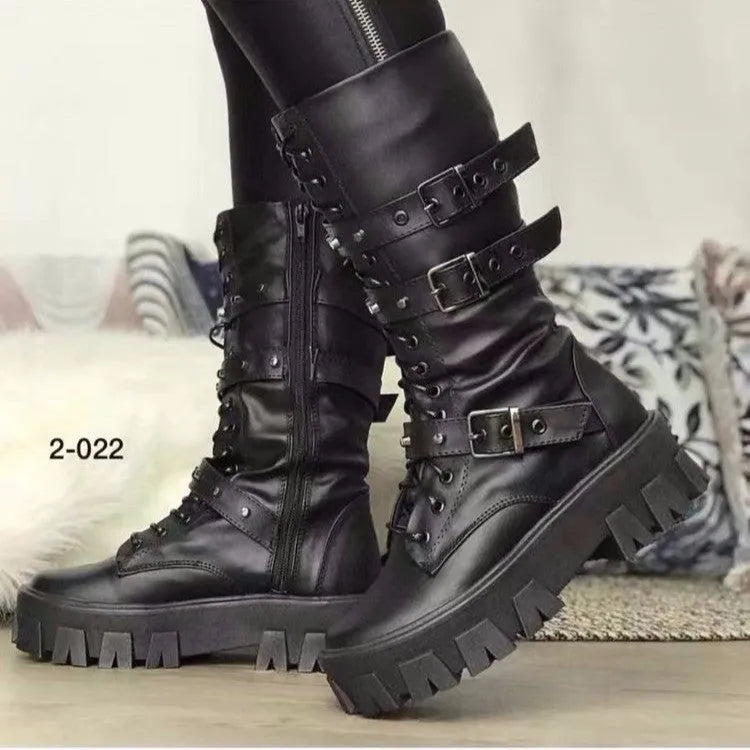 Women's black mid-calf knight boots with a large metal buckle and side zip.