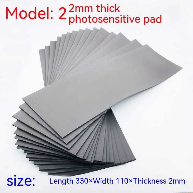 Black and grey photosensitive rubber sheet for seal making, showing 330mm by 110mm size.