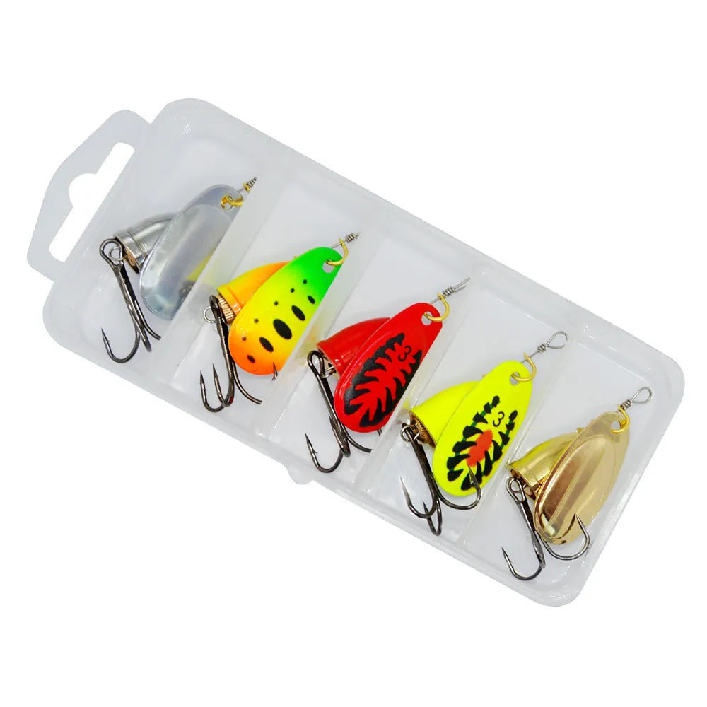 R composite metal fishing lure with a rotating sequin and copper bell in various metallic colours.