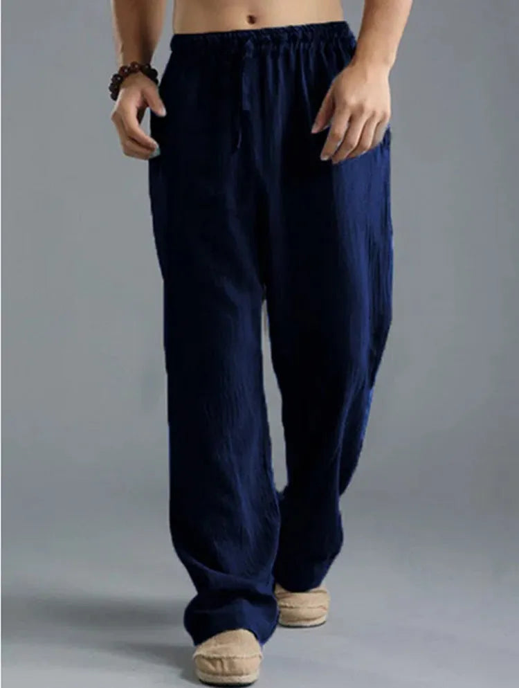 Men's linen loose casual sports pants in khaki, side view, on a hanger