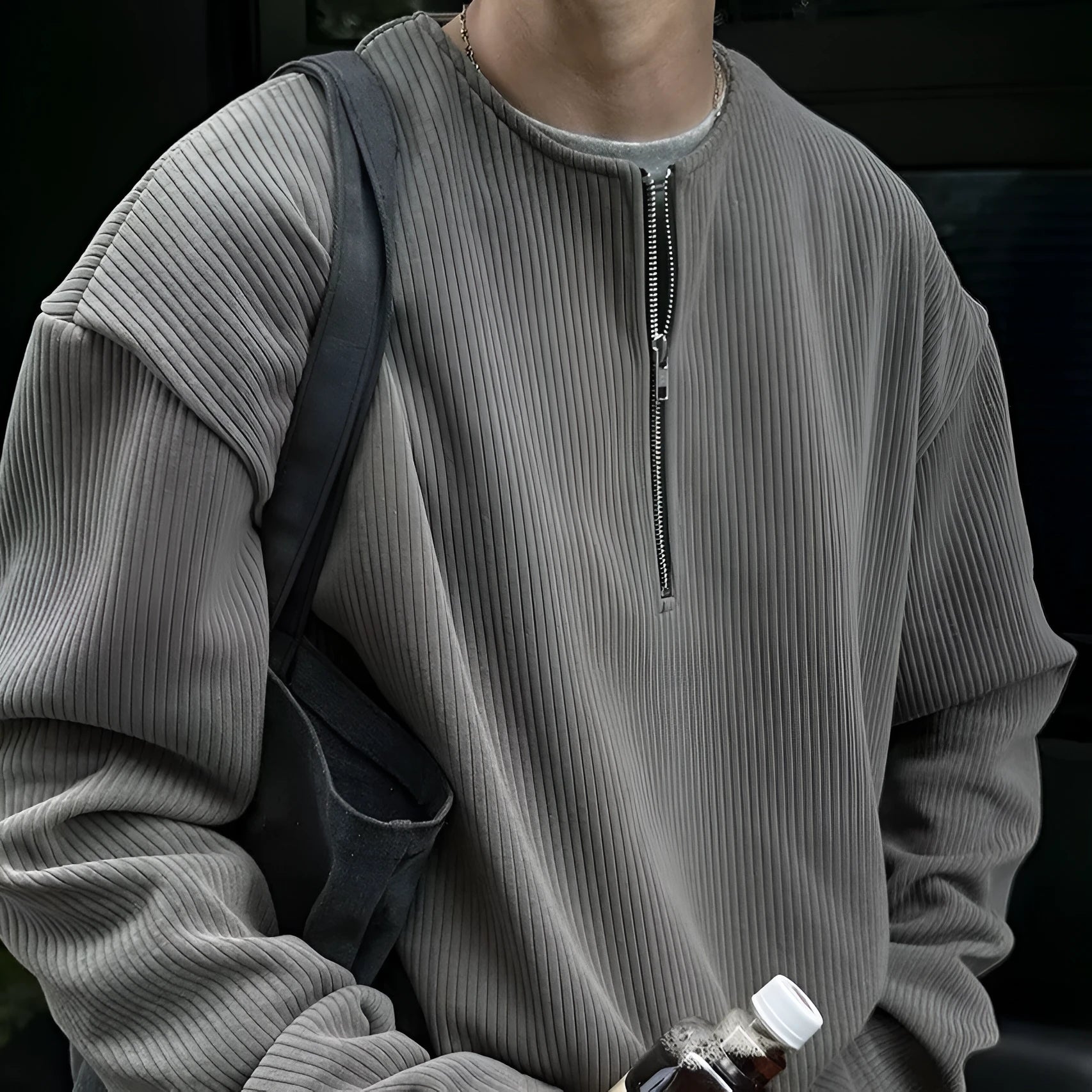 Grey loose-fit long sleeve polyester pullover top for early spring