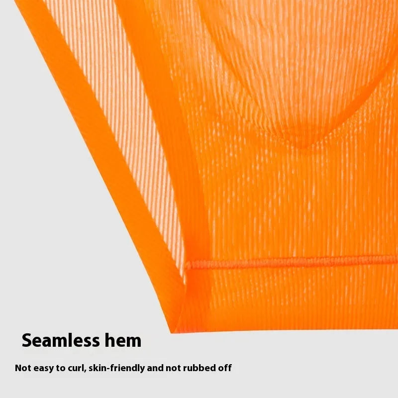 Seamless low waist ice silk briefs in black, showing ribbed texture and thin fabric