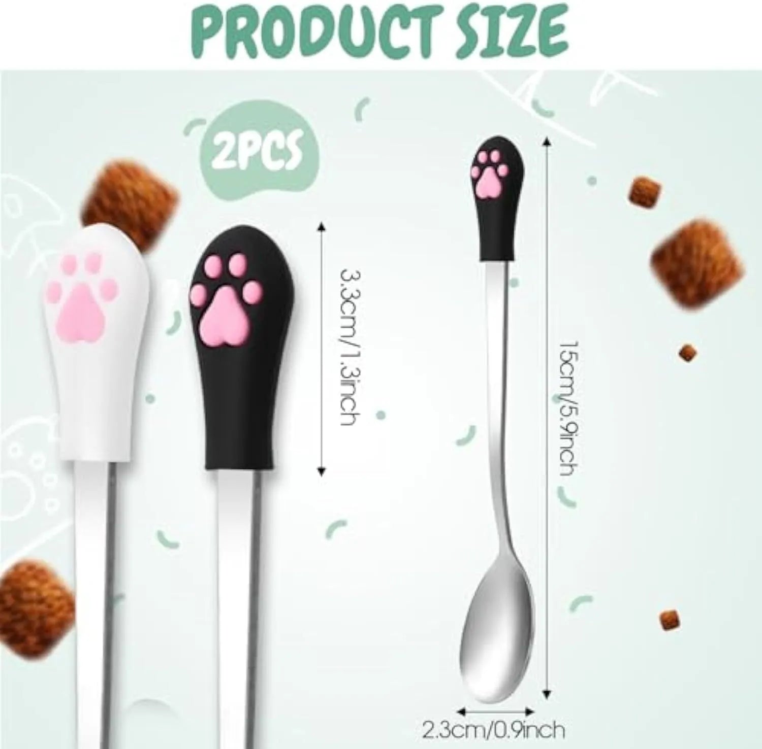 Two pet food spoons with cat paw designs in white and black colours