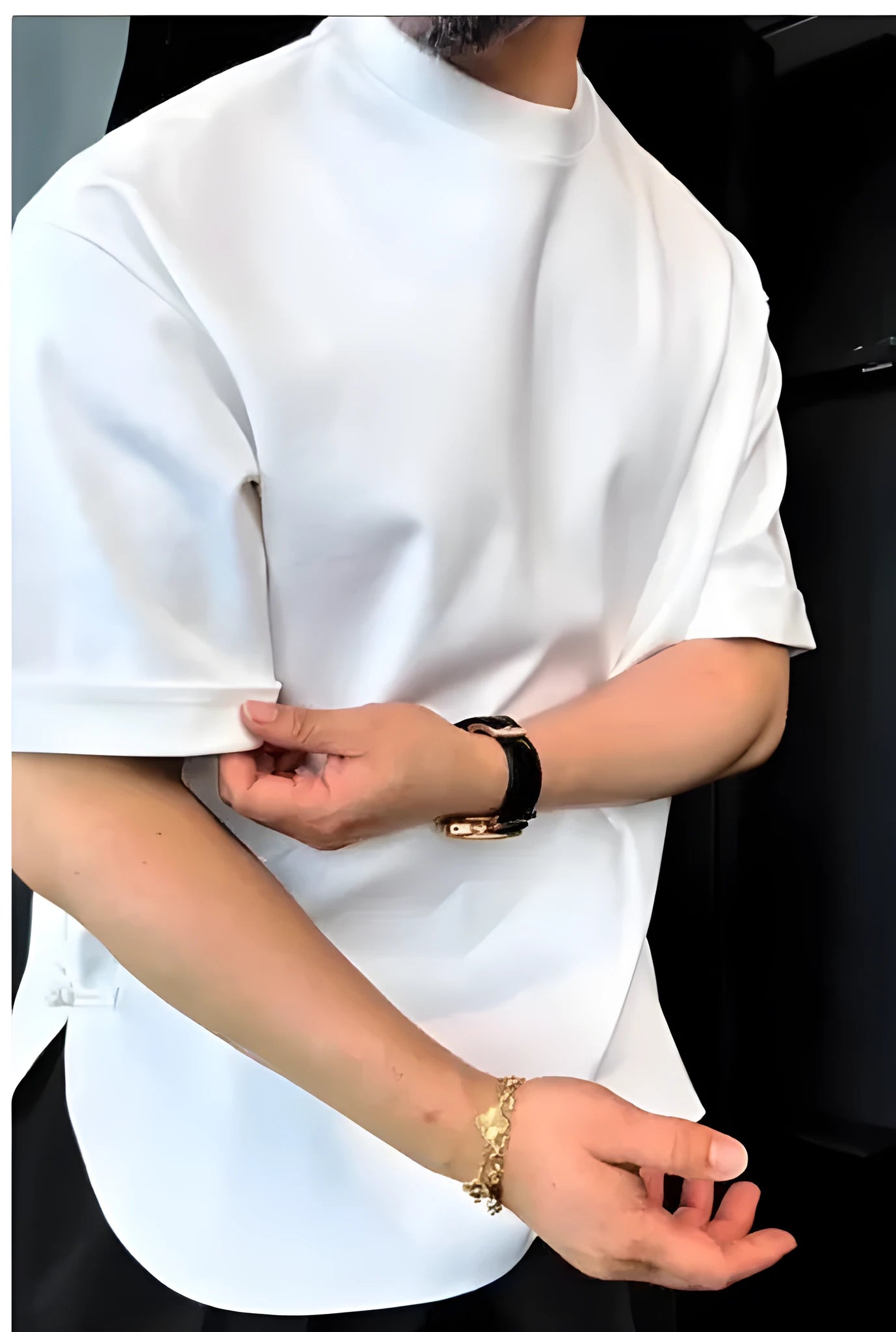 Men's white buttoned round hem short sleeve cotton T-shirt on a hanger.