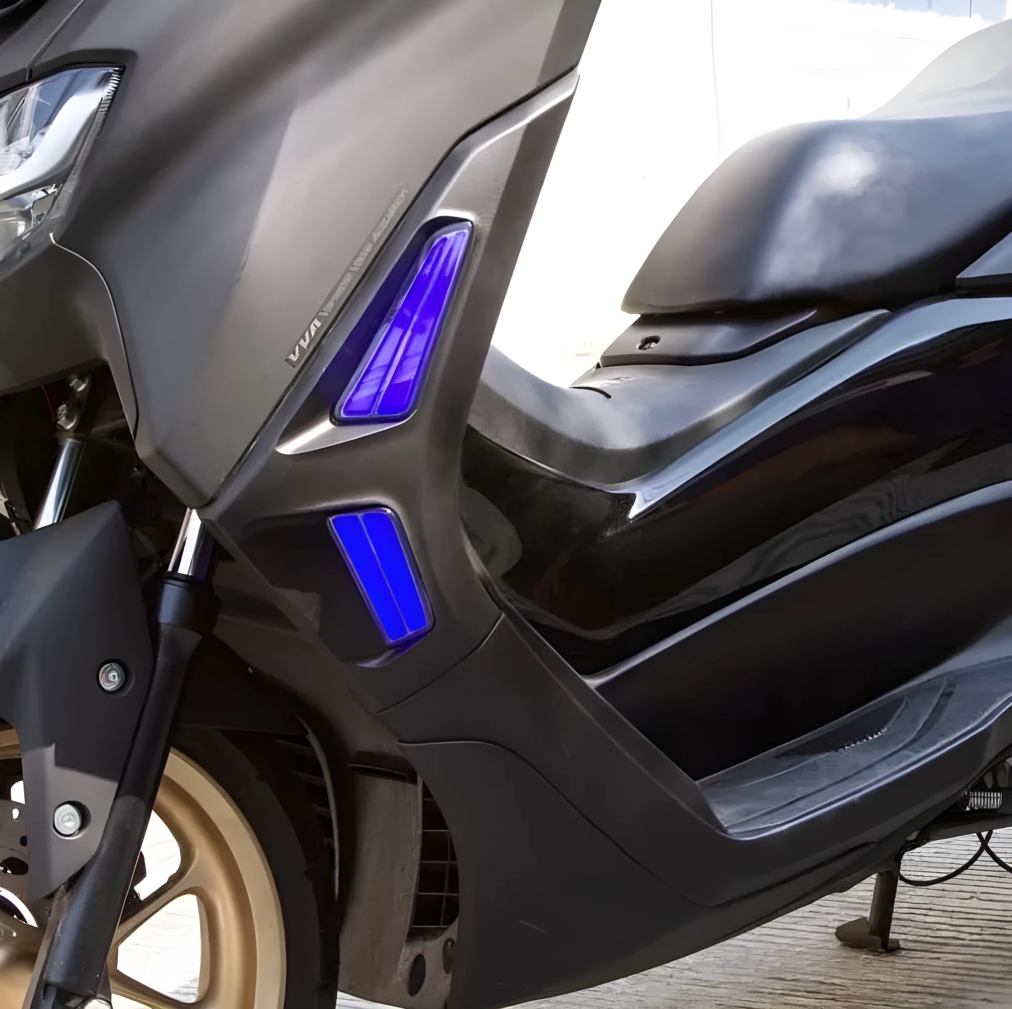 Pair of LED steering turn signal lights for Yamaha NMAX155 scooter on a white background.