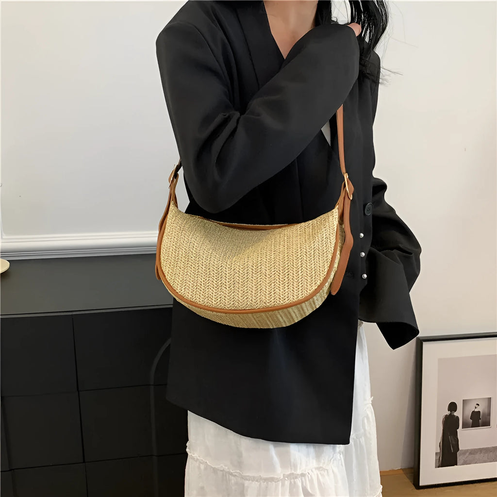 Women's woven straw crossbody bag showing internal phone and document pockets in corrugated brown colour