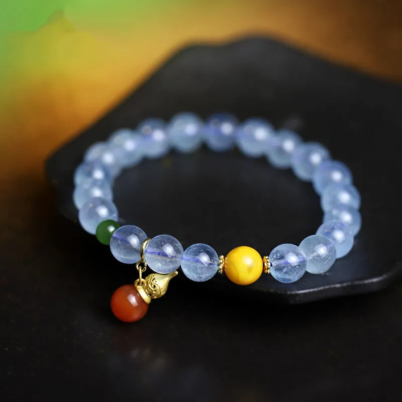 Women's bracelet with an 8mm geometric aquamarine crystal in an iced colour on a band.