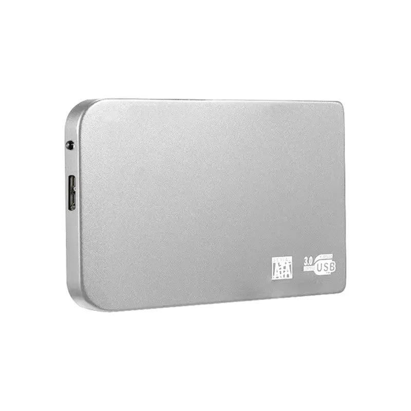 Silver USB 3.0 solid state mobile hard disk with data cable on a desk.