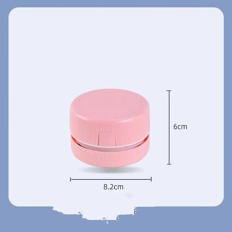 Mini desktop handheld vacuum cleaner in pink colour for pencil eraser chip cleaning