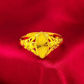 Gold electroplated brass ring with geometric open diamond flower design and textured surface