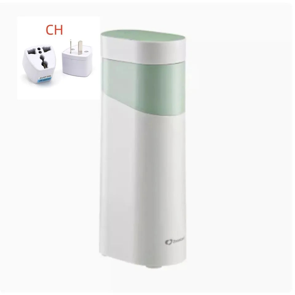 Black and green compact desktop instant hot water dispenser with digital display and water tank.