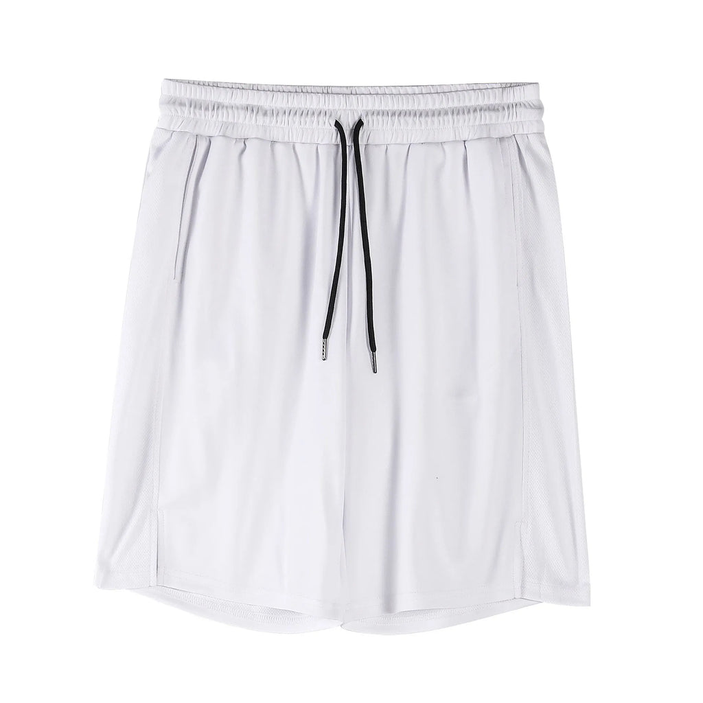 Man wearing black quick-drying mesh fitness shorts with an elastic mid-waist and loose fit.
