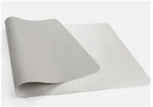 Leather desk mat in multiple sizes and colours for office or study use, shown on a desk with a computer mouse.