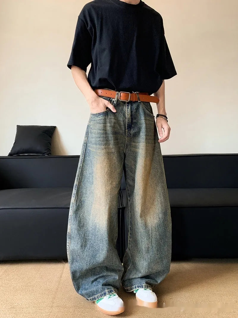Men's retro blue distressed wide-leg denim jeans with micro-elastic fabric and zipper fly