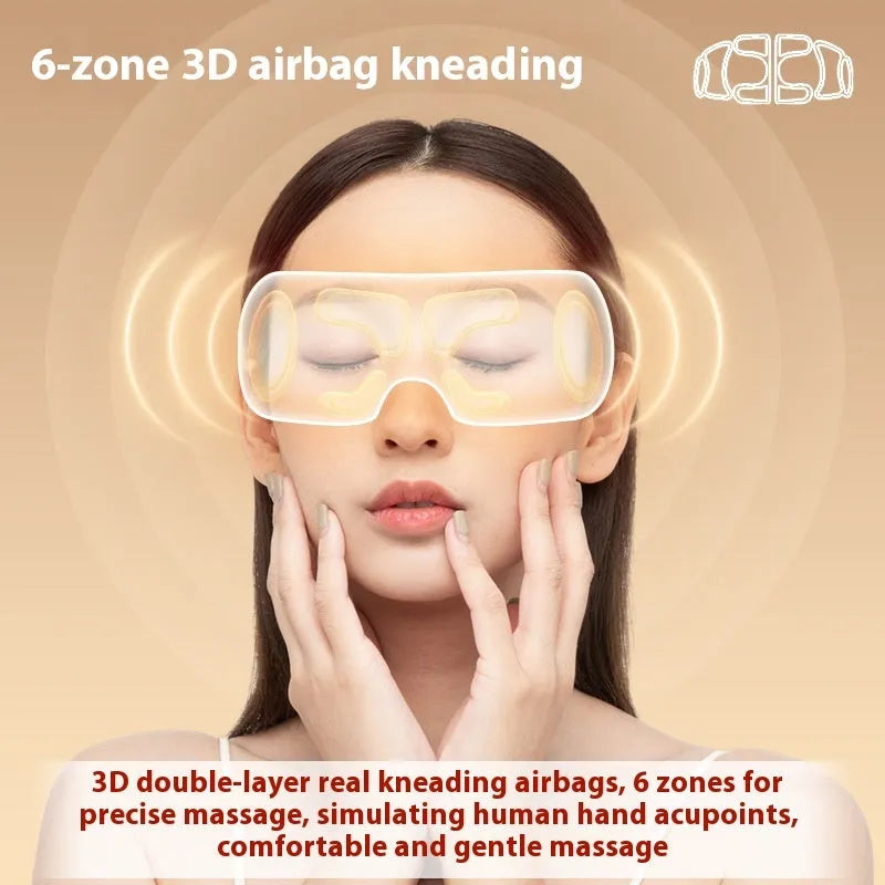 White rechargeable airbag massage and hot compress eye massager with charging cable