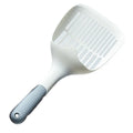 White plastic cat litter scoop with attached storage base on a white background.