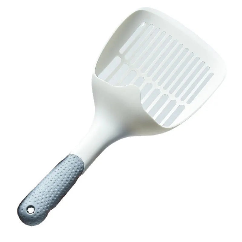 White plastic cat litter scoop with attached storage base on a white background.
