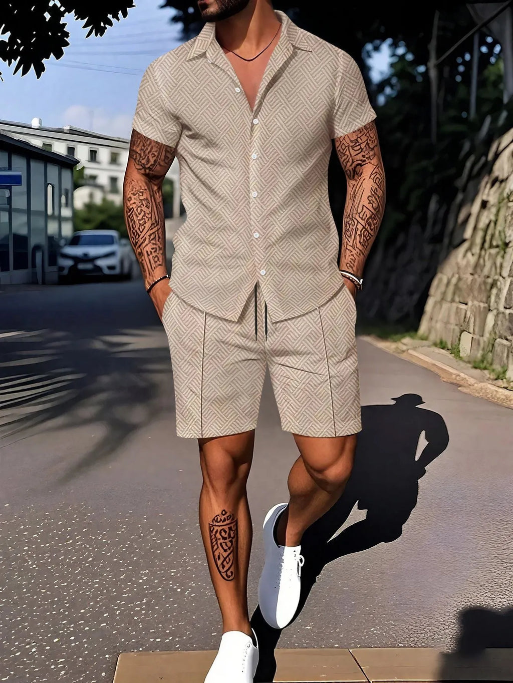 Man wearing a casual short sleeve digital print suit set consisting of a top and matching shorts.