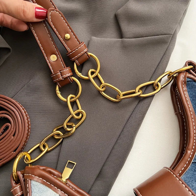 Brown denim women's bucket shoulder bag with diamond mesh panels and chain straps