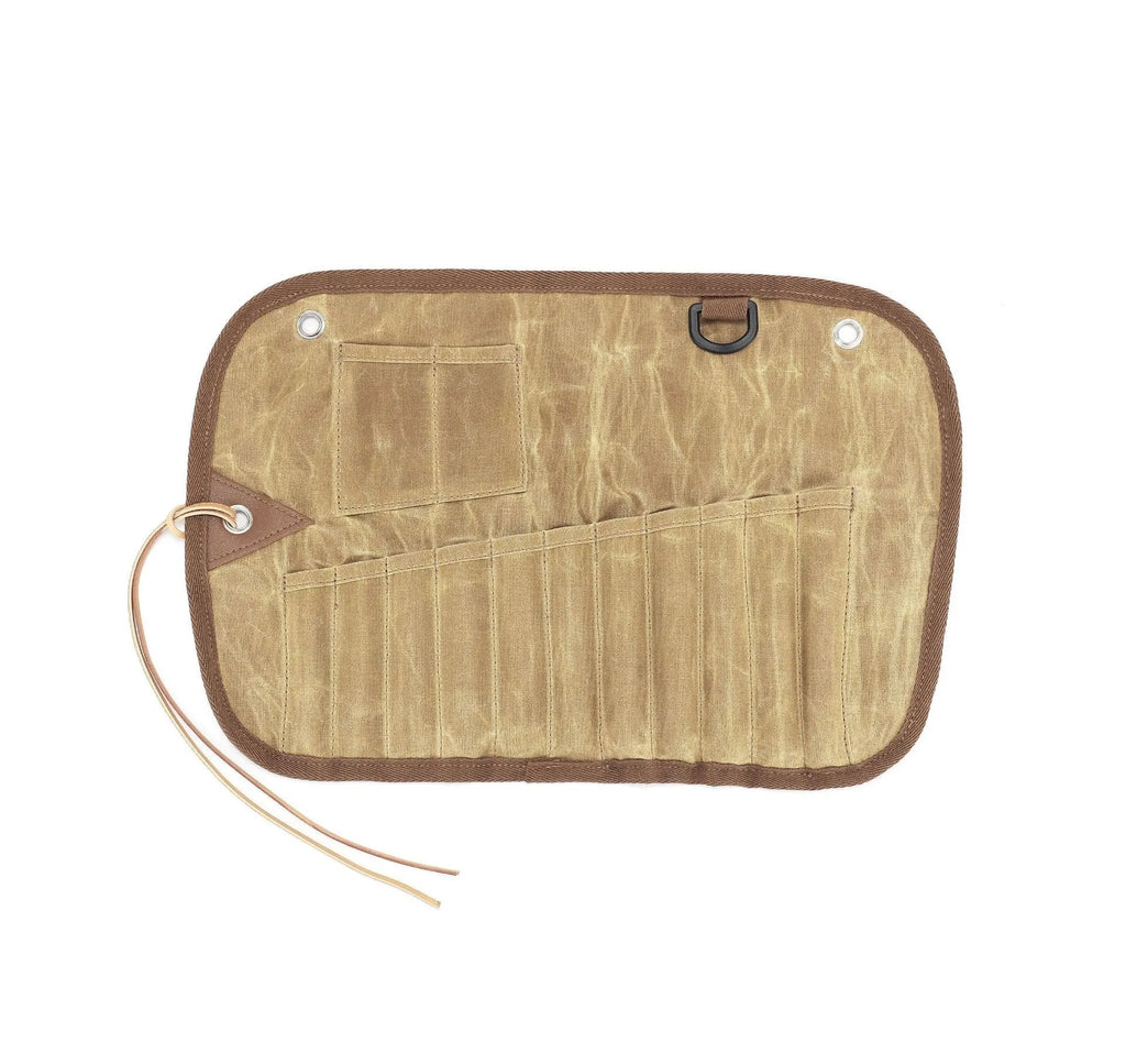 Beige waxed canvas tableware storage bag with wooden handle chopsticks, knives, forks, and spoons inside.