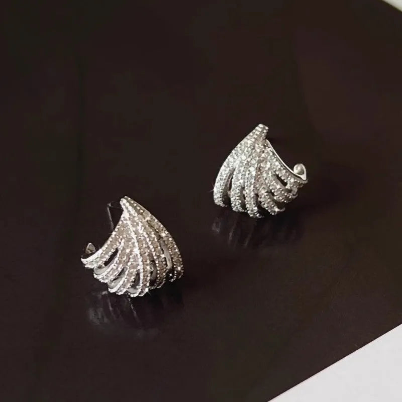 Geometric line design earrings with zircon stones in platinum colour electroplated finish