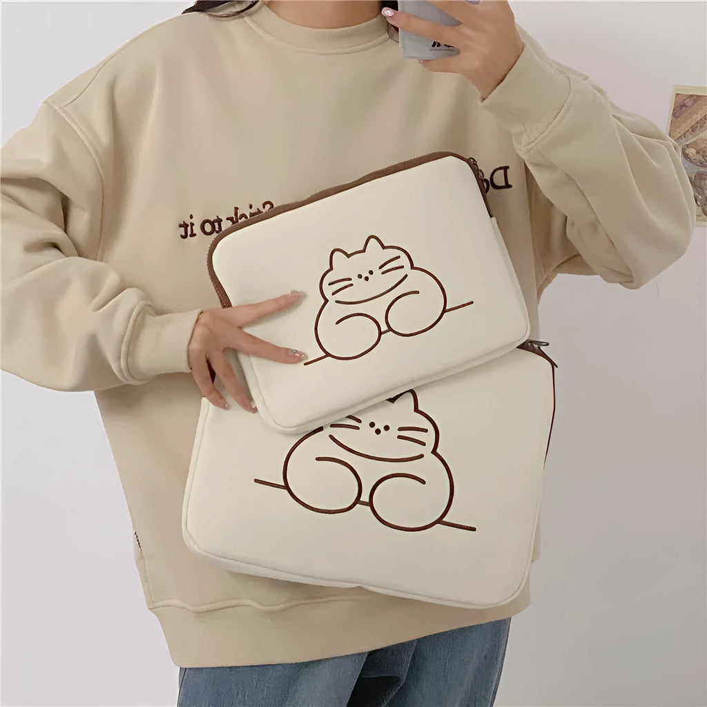 Fat cat embroidered design on a grey protective laptop sleeve with a black zip.