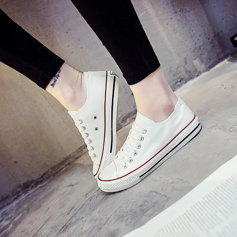Women's solid colour canvas casual shoes in black, white black, white red, and all black colourways