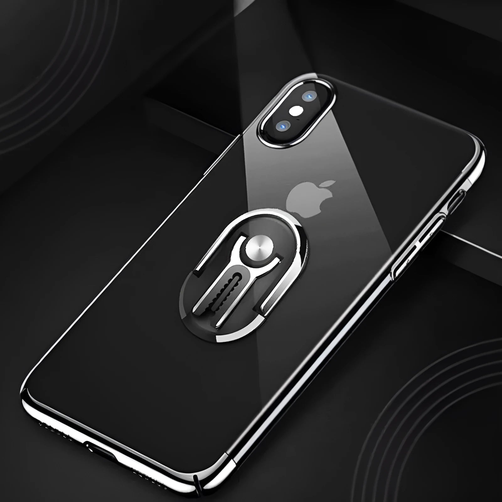 Universal car mobile phone mount bracket attached to car air vent showing adjustable clamp and 360-degree rotation ball joint