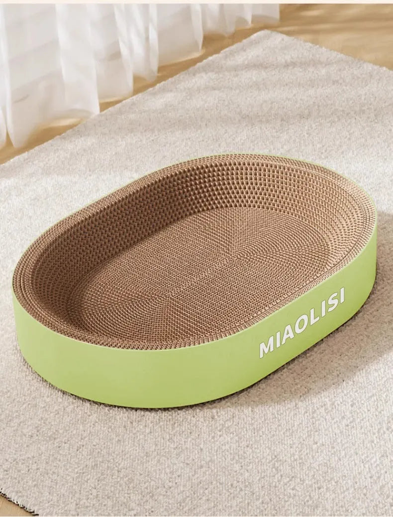Green oval corrugated cardboard cat scratch board and nest bed, 55cm diameter