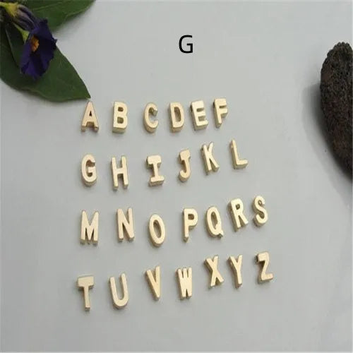 Peach heart shaped letter necklace pendant in gold and silver alloy colours.
