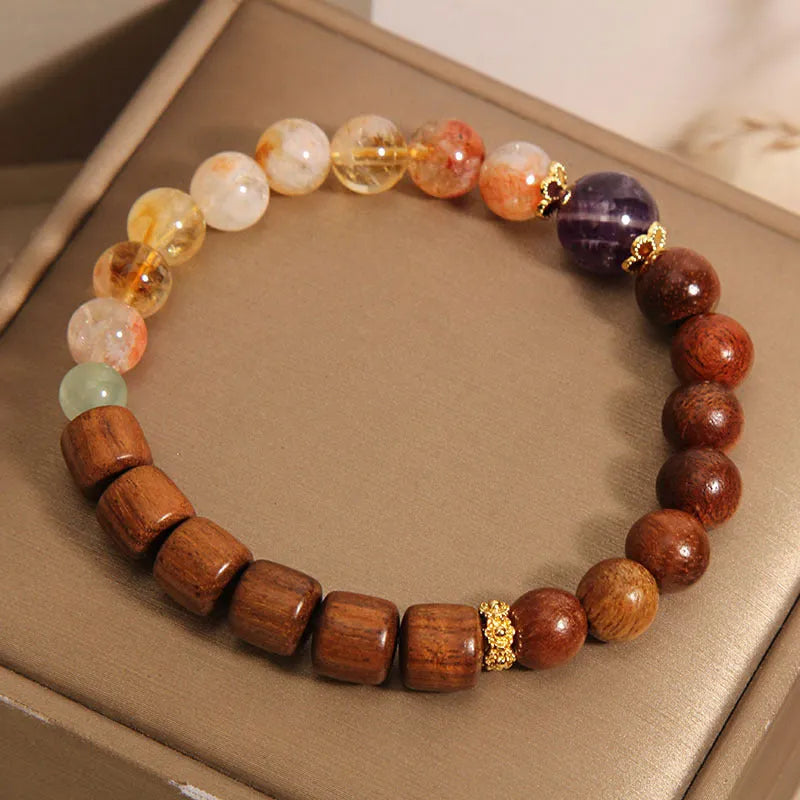 Women's crystal bracelet with yellow tower crystal and ebony amethyst beads featuring pearl accents