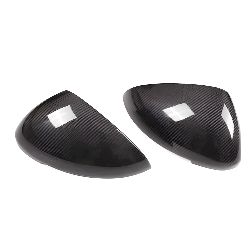 Black true carbon fibre rearview mirror covers for 14-22 Porsche Macan with visible weave texture