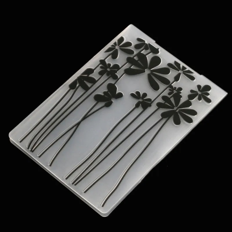 Plastic folding cake decorating mould showing windmill and five-pointed star design options