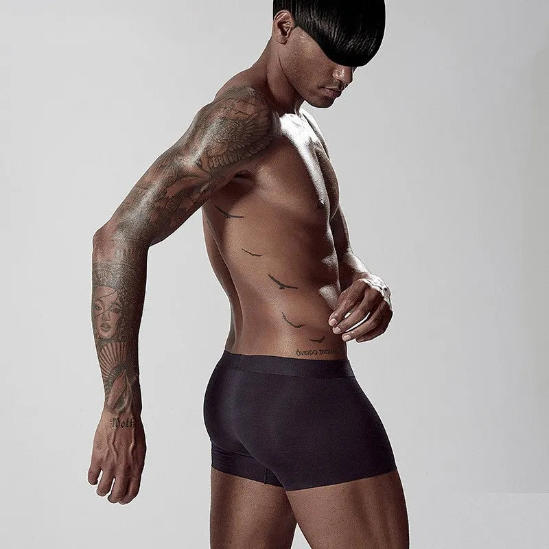 Seamless modal men's underwear in white, pink and green colours with mid waist design