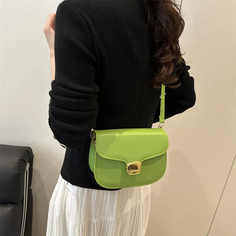 Simple PU handbag in khaki colour showing internal phone compartment and change pocket