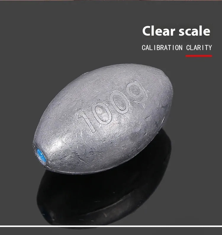 Tongxin olive lead fishing sinker with scale markings, showing rugby shape and plastic core.
