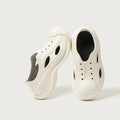 Fashion thick-soled EVA clogs slippers in black for women and men, non-slip indoor outdoor beach shoes with wrapped toe
