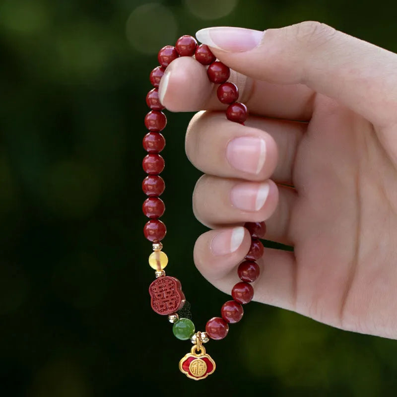 Emperor sandstone Fu character bracelet with happy eyebrow pattern in 6mm or 8mm cinnabar bead sizes