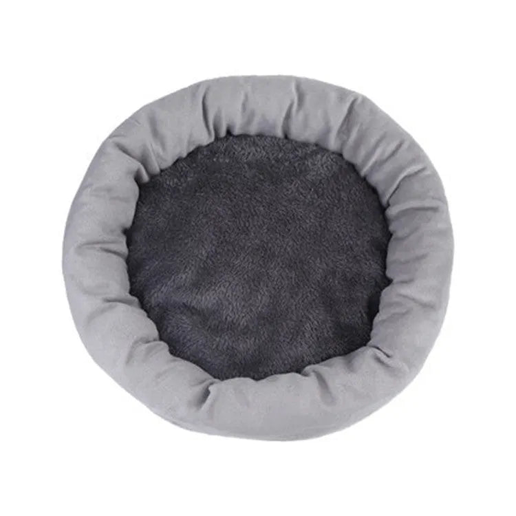 Light grey cloth dog bed with soft PP cotton filling, shown in size L (46cm diameter) on a wooden floor.